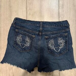 denim shorts with rhinestone heart and wing design on back pockets, woman size 8